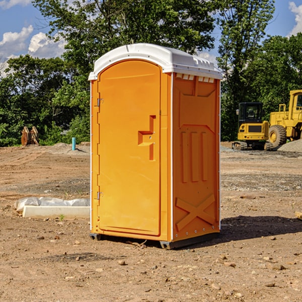 how often are the portable restrooms cleaned and serviced during a rental period in Fayette County